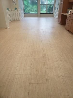 Before a completed hardwood floor waxing project in the Vero Beach, FL area